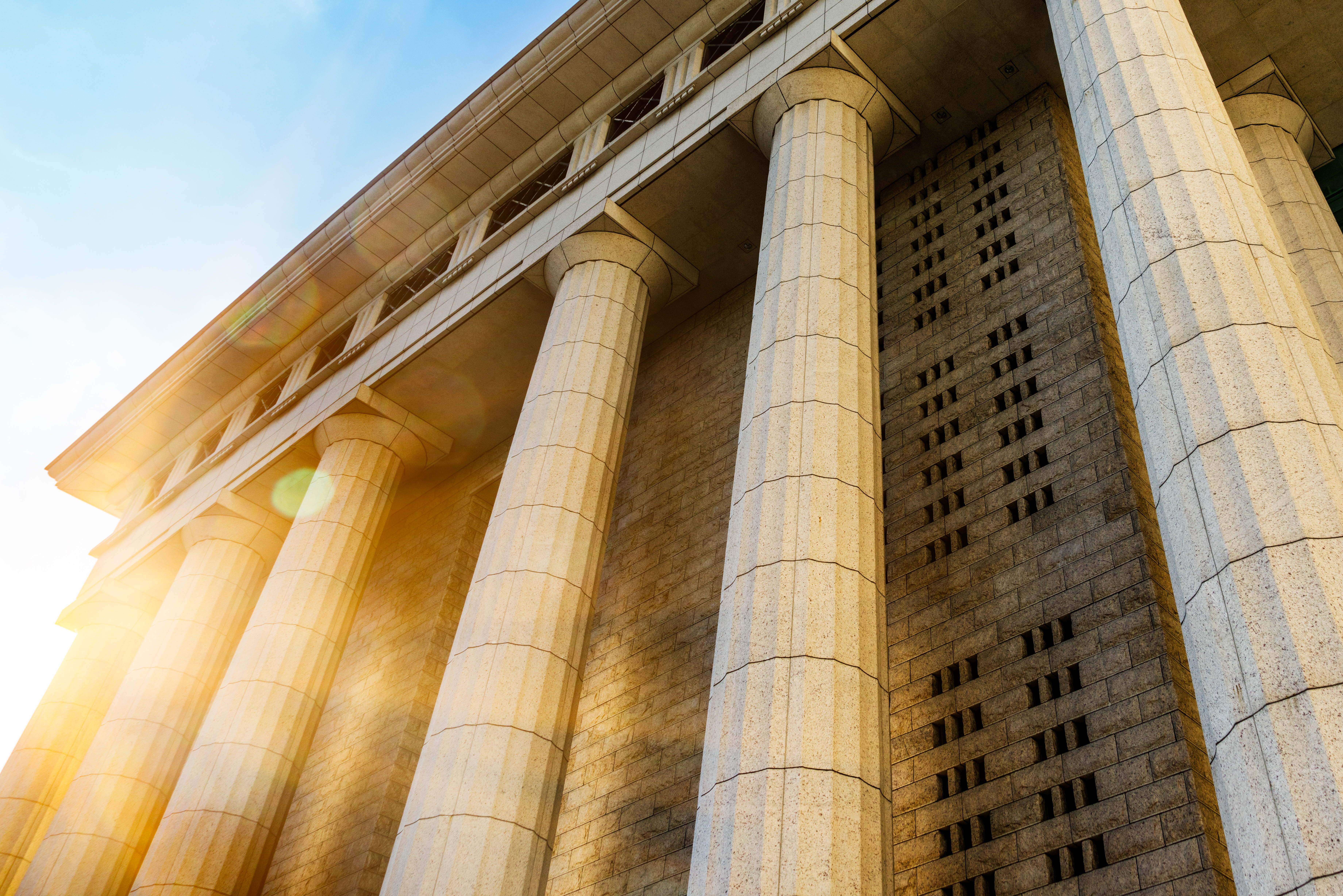 Courthouse with columns photo leading to Criminal Law page